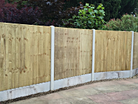 Lap Fence with intermediate concrete posts & Gravel Boards