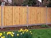 Completed Vertical lap fence with intermediate concrete posts